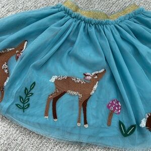 Whimsical tool appliqué deer skirt. Mini Boden Size 7-8